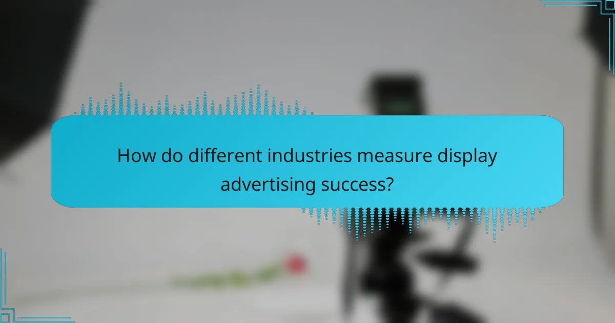 How do different industries measure display advertising success?